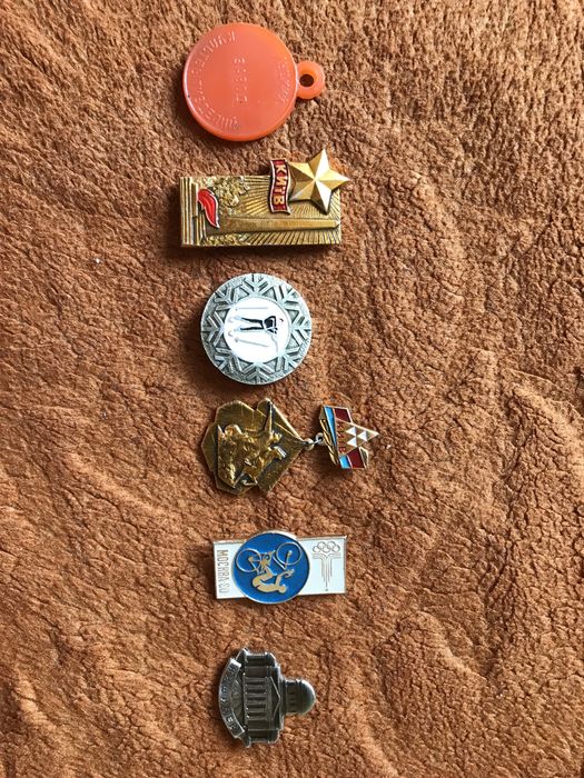 Значки різних років.