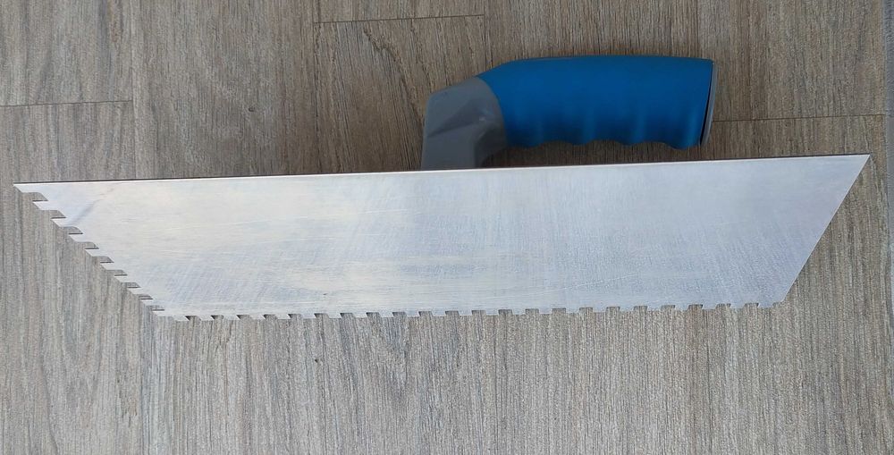 Гладилка з нержавіючої сталі 120x280 мм .