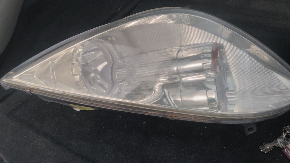 Óptica Mitsubishi Colt lado do condutor