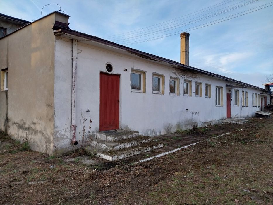 Działka przemysłowa, teren inwestycyjny wraz z zabudowaniami.