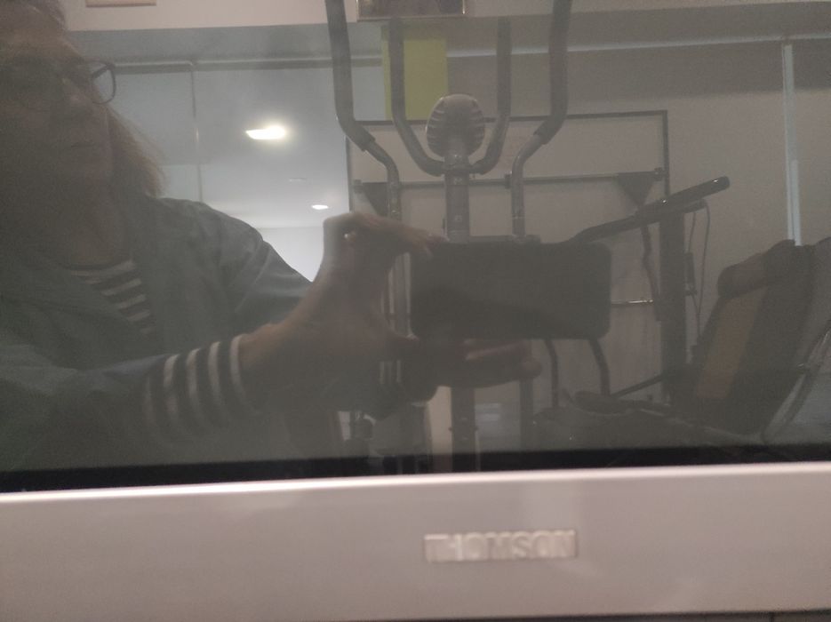 Selling a television (functional with remote control) and stand.64752024526082121