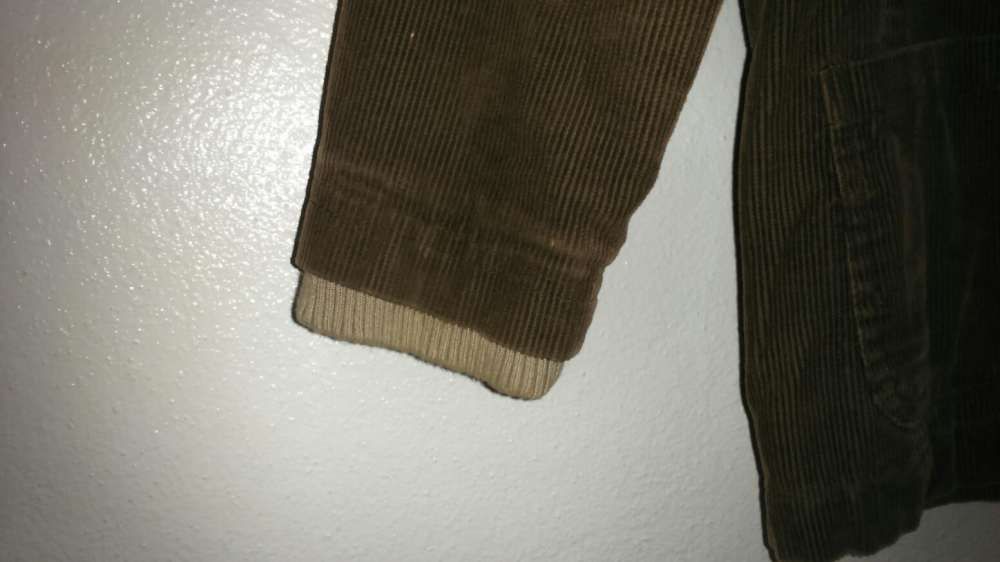 Casaco castanho tipo blaser de bombazine para rapaz da Zara.