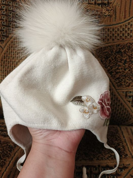 Зимові шапки на дівчинку