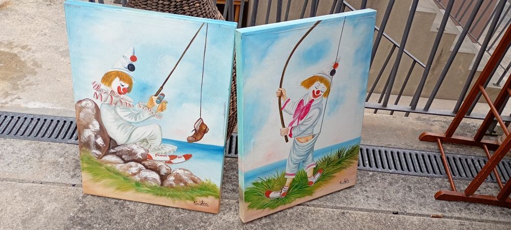Dois quadros palhaço pescador.
