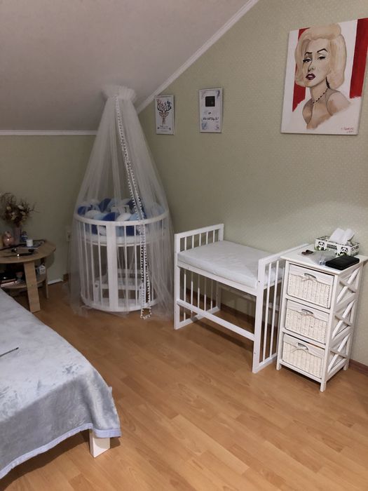 Дитяче ліжечко-трансформер