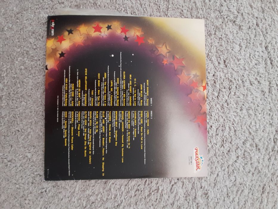 Álbum de vinil duplo com uma colectânea de êxitos Poly Star