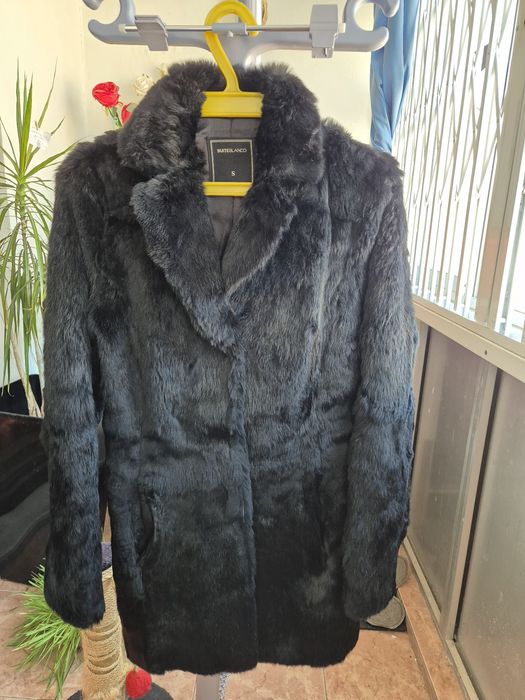 Casaco de pêlo preto