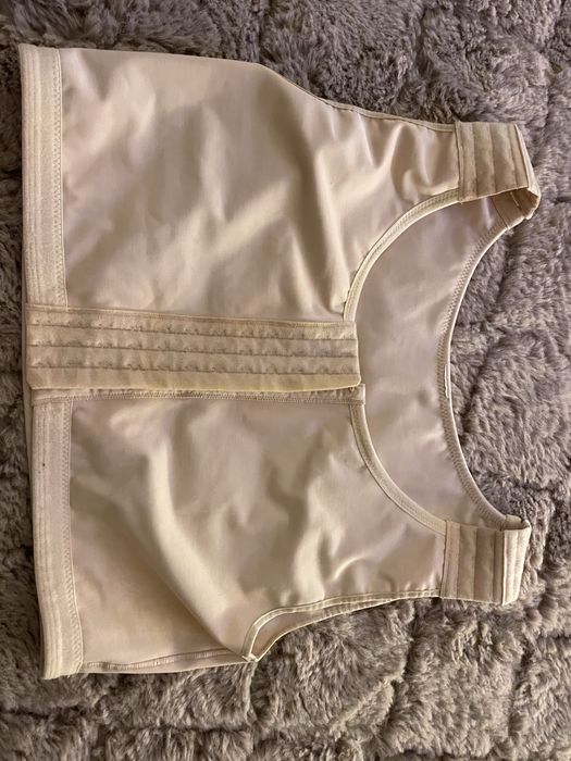 Colete de compressão L