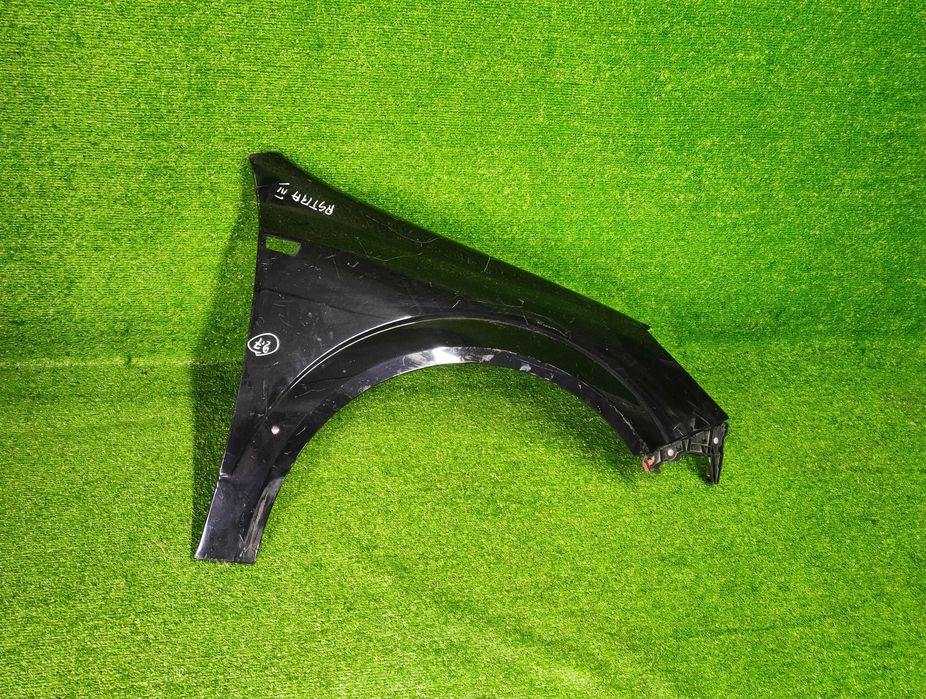 Błotnik przód przedni Prawy Opel Astra H III 2004-