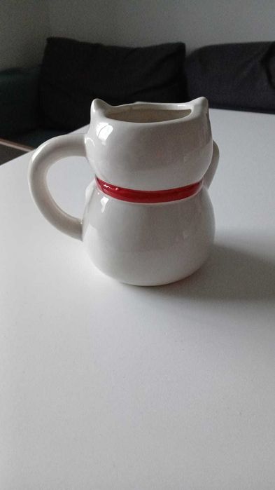 Caneca de cerâmica do gato da sorte
