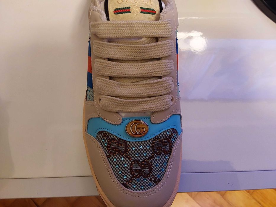 Sapatilhas Gucci.