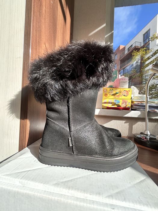 Зимовє дитяче взуття