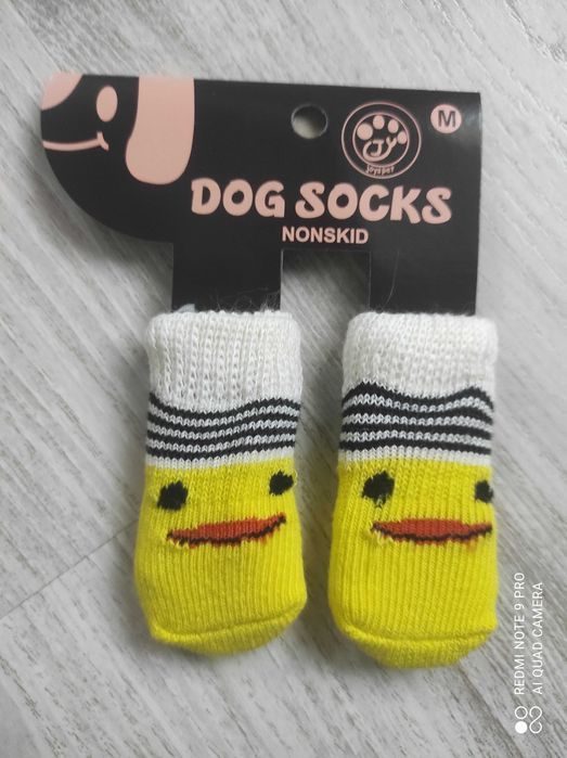 Яскраві носочки  собачці або котику.
