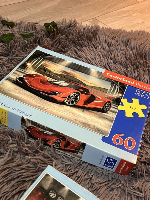 3 sztuki puzzli z autami (jedne zafoliowane,2 używane) 2x180 i 1x60 e.