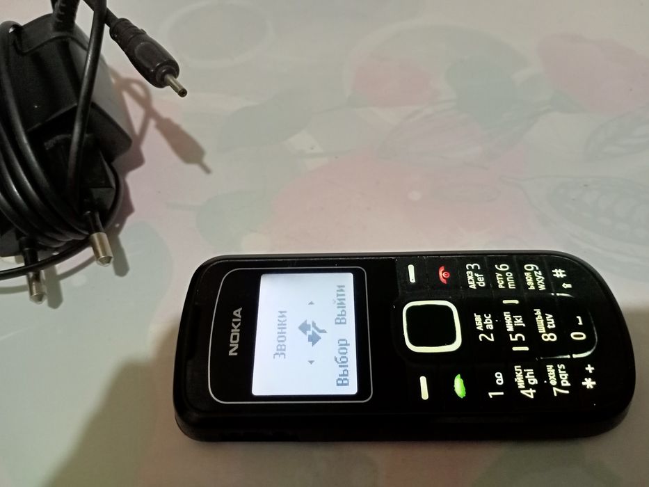Продам мобильный кнопочный телефон Nokia 1202-02.