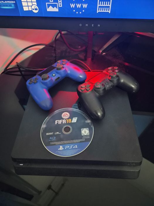 Ps4 slim 500Gb + jogo + 2 comandos.