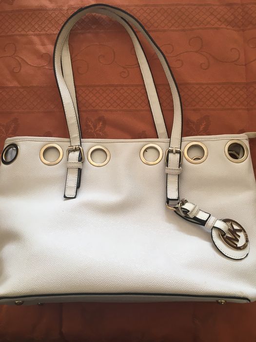 Bolsa de senhora e carteira de mão