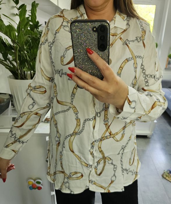 Biała bluzka koszula łańcuchy wiskoza Salko XL- XXL

Niewielka wada za