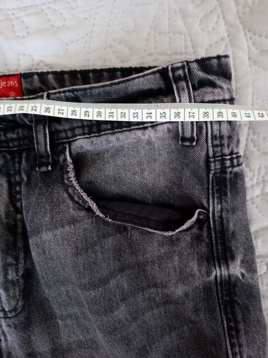 Cropp Spodnie męskie,chłopięce z dziurami rozm 30/32