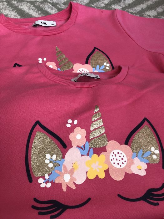 Bluzy dla bliźniaczek  różowe 2 szt .rozm 134