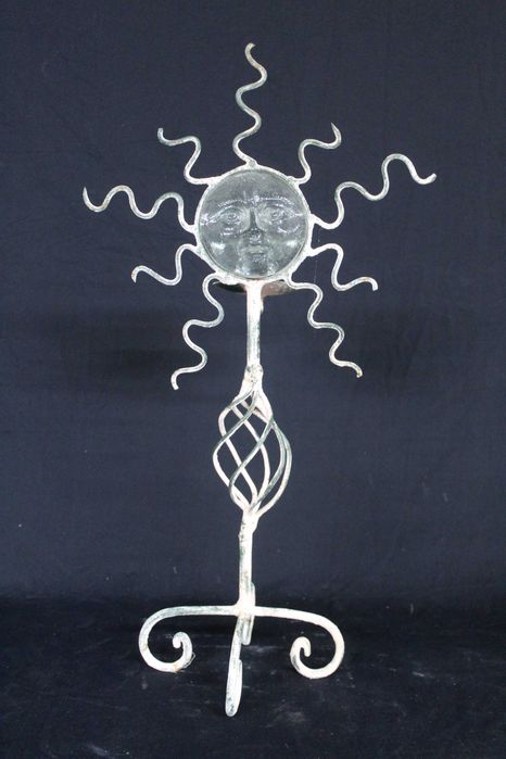 Castiçais em ferro e vidro