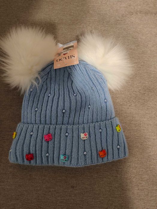 Продам  шапки женские