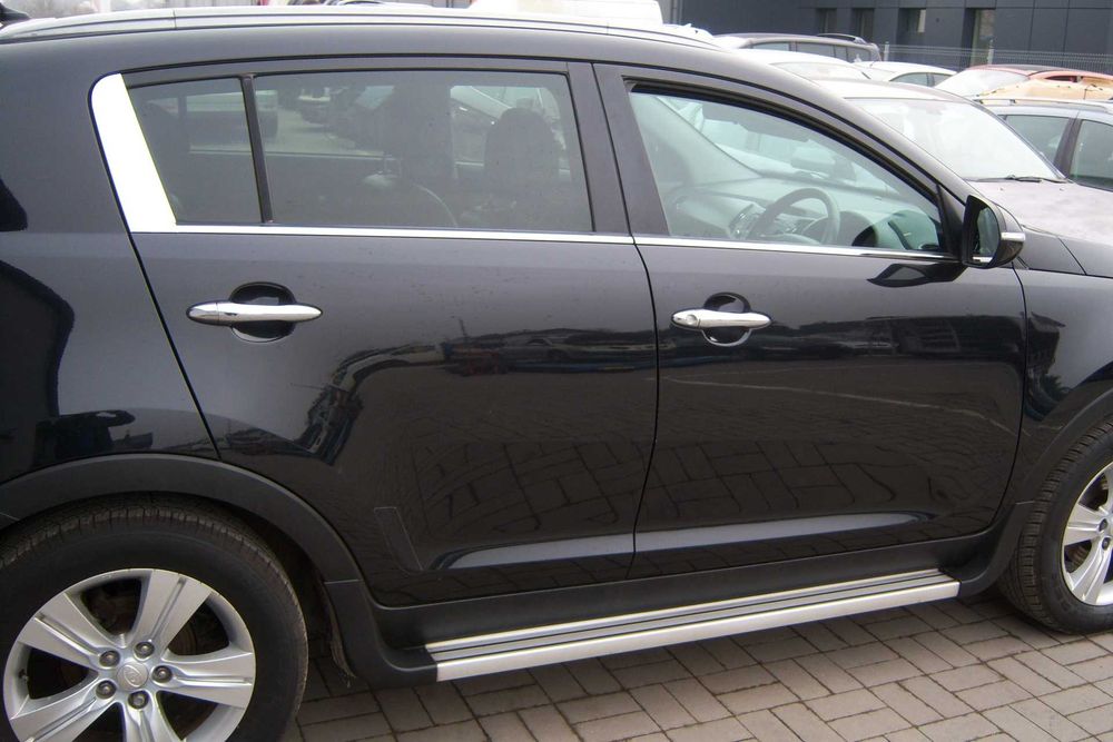 Kia Sportage III drzwi prawy przód tył kolor 1K