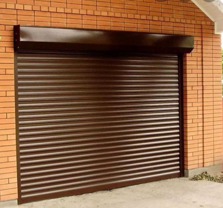 Гаражні ворота секційні та ролетні на пряму від заводу Рострочка