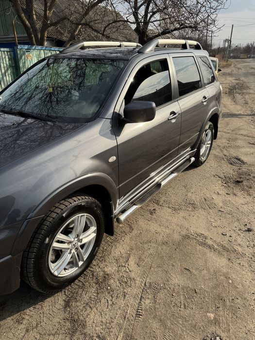 Продам OUTLANDER 2.4