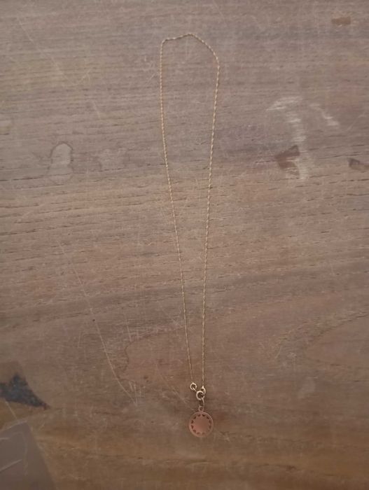 Corrente em ouro com pendente devidamente contrastada