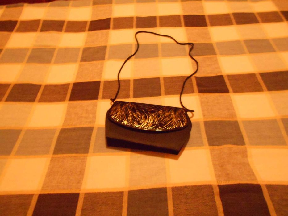 Pochete nova, para cerimónias.