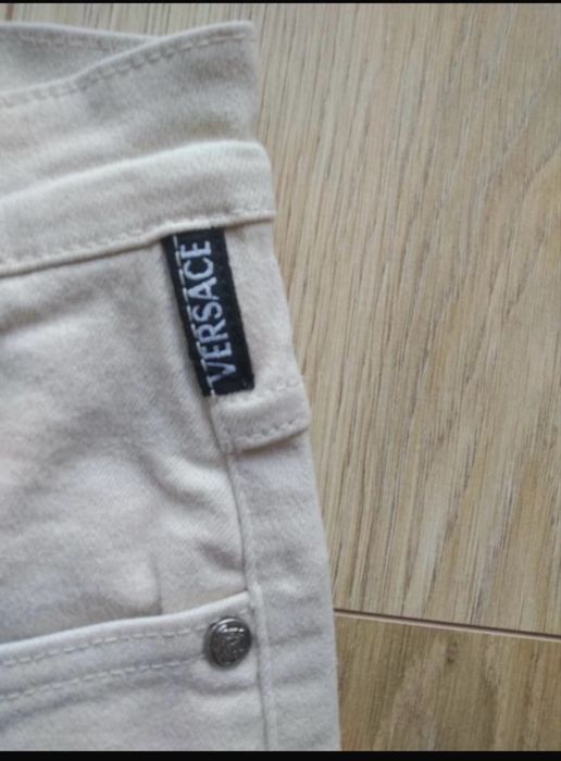 Spodnie. Versace