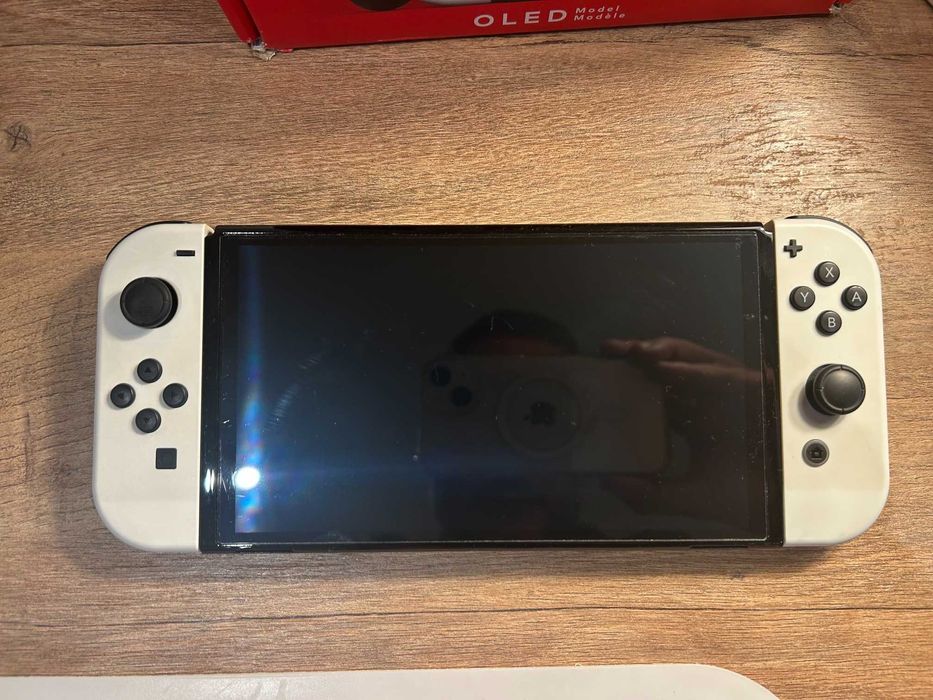 Nintendo Switch Oled + 4 jogos + caixa + bolsa – Excelente estado