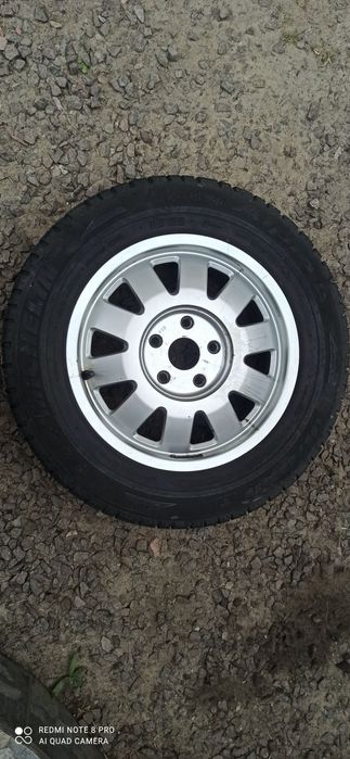 Оригінальний титан 5/112  Audi з зимовою резиною , в ідеальному стані