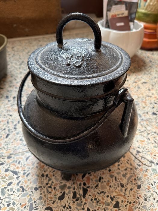 Cast iron pot.449690795141376001