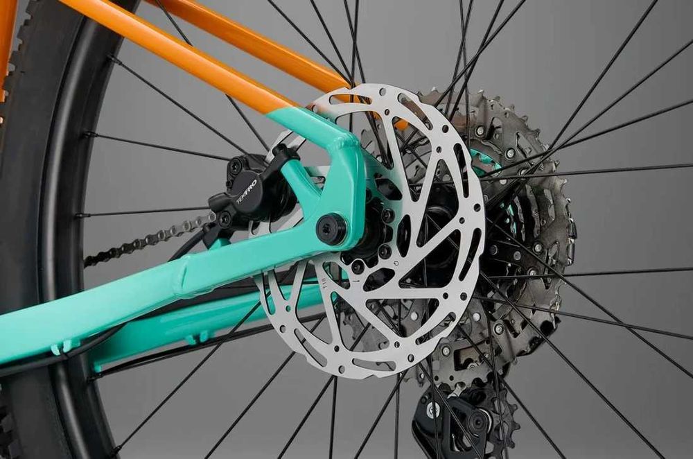 Rower Whyte Secta S – rower MTB 29", RockShox Recon Silver RL 130 mm, Shimano CUES 1x10 L pomarańcz z turkusem
