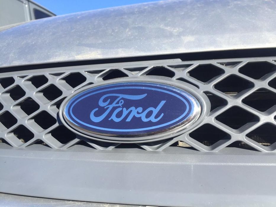 Ford Fiesta 2002-2008 рр. Емблема передня (на клямках)