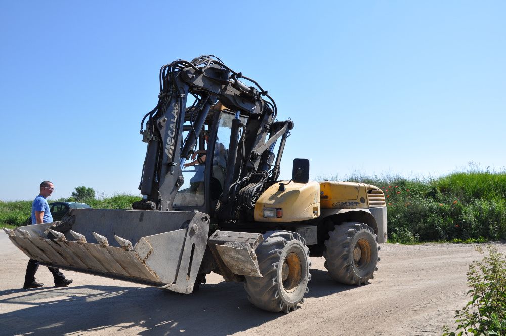Usługi koparką Mecalac, wynajem koparko ładowarka, kucie młotem