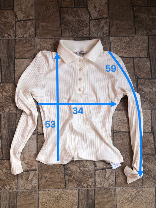 Білий лонгслів-поло в рубчик