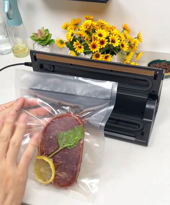 Вакуумний пакувальник