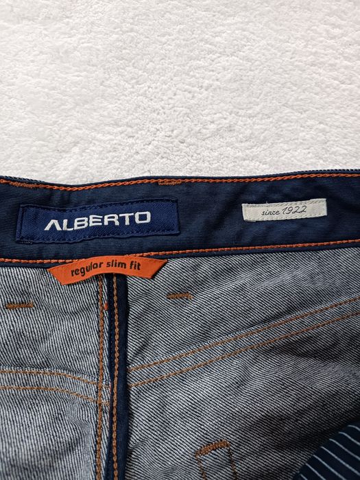 Spodnie dżinsowe damskie rozmiar W32 L34 Alberto