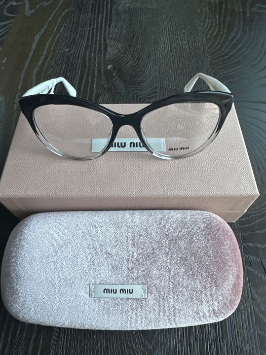 Okulary korekcyjne marki Miu Miu MU 04RV col. 114101