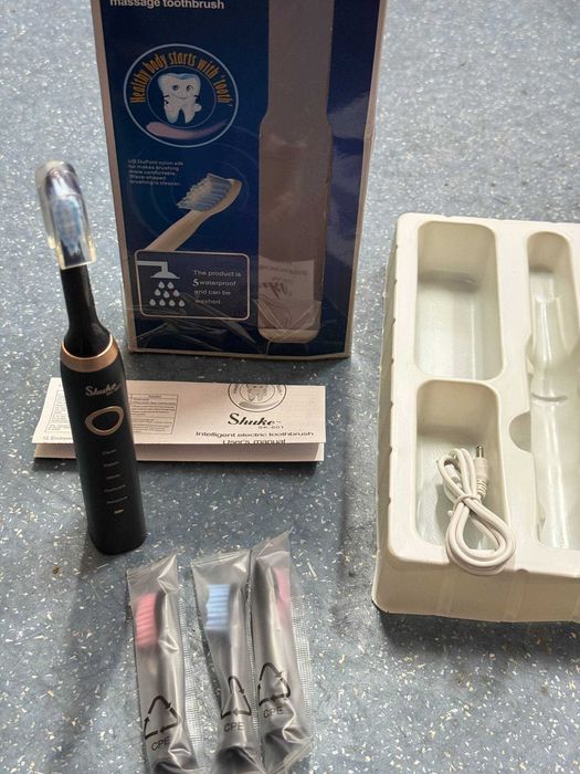 Зубна електрощітка shuke sk601-s, usb - зарядка, 4 насадки