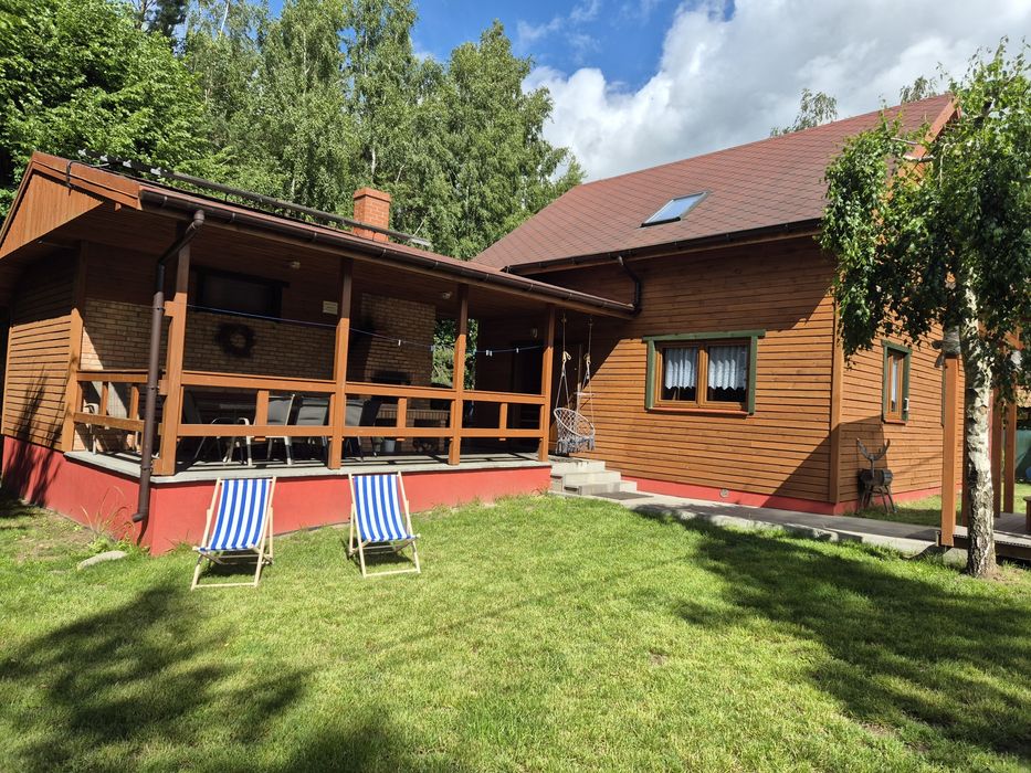 Domki letniskowe z kominkiem, jacuzzi i sauną.
