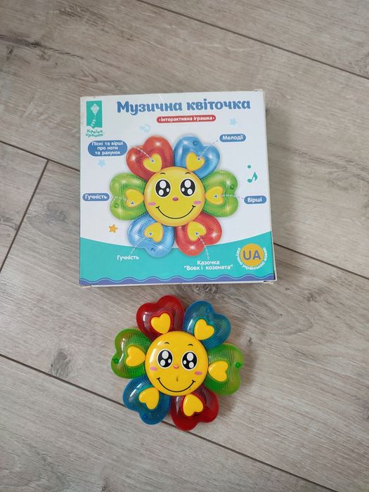 Іграшка музична квітка