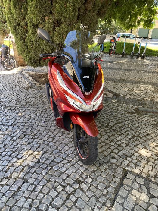 Vendo mota p c x bem estimada coimo nova 1 só dono