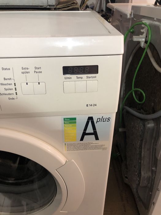 Пральна машина з баком для води