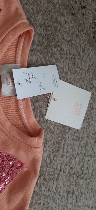 Bluza z cekinowymi kokardami rozm. Xxl