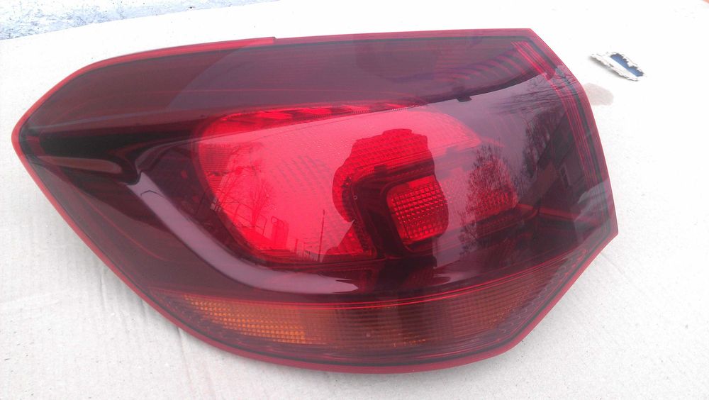 Ліхтар фонарь Opel Astra J Tourer