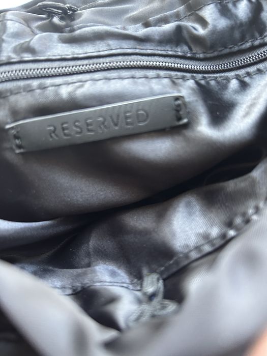 Актуальна сатинова сумка Reserved